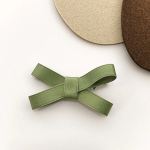 Grass green ribbon bow hair clip with high-quality ribbed texture and metal duckbill grip
