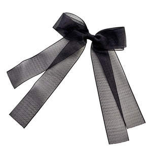 Elegant large black organza bow hair clip with long ribbons and sheer texture