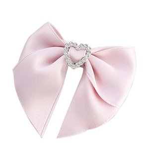 Barrette à cheveux nœud en satin rose avec centre en strass en forme de cœur élégant