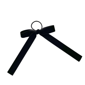 Elegant black velvet bow hair tie with long ribbons for women minimalist style