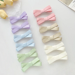 Lot de 12 barrettes à cheveux nœuds en couleurs pastel macaron en tissu satiné mat