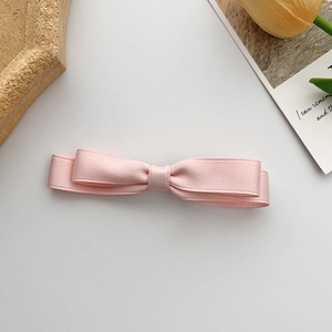 Elegante fermaglio per capelli con doppio fiocco rosa chiaro in nastro di gros grain