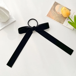 Elegant long black velvet bow hair scrunchie with ribbons for women's hairstyle