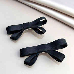 Elegante Haarspangen mit schwarzen Satinschleifen im Doppel-Design für Damen, 2er-Set