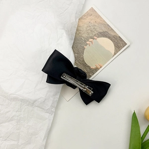 Elegant black satin rose bow hair clip with silver metal alligator clamp for women