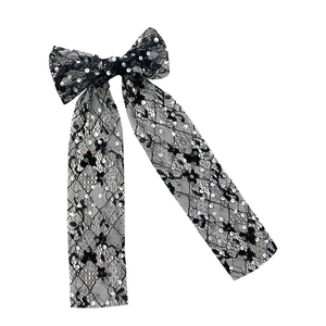 Elegant black lace bow hair clip with silver fish scale sequins and long streamers