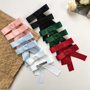 Set di eleganti fermagli per capelli con fiocco in raso in vari colori vivaci