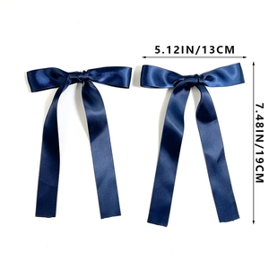 Pair of navy blue satin ribbon bow hair clips for ballet aesthetic hair styling
