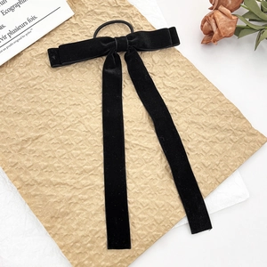 Japanese style black velvet bow hair tie with long ribbons for elegant hairstyles