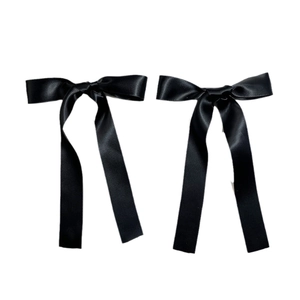 Pair of black satin bow hair clips with long ribbons in elegant Japanese ballet style
