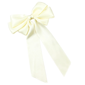 Elegant cream beige satin ribbon bow hair clip with long streamers on white background