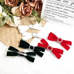 Elegant velvet bow hair clips with rhinestone accents in red, green and white colors