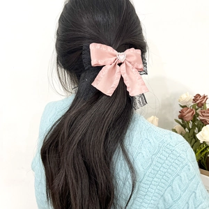Elegant pink ribbon bow hair clip with heart rhinestone and black lace for women
