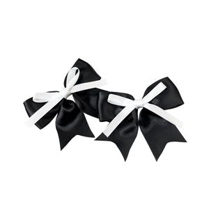 Japanese style black and white satin bow hair clips for women with elegant layered ribbon design