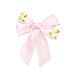 Fermaglio per capelli a fiocco in raso rosa con rose decorative per un look floreale