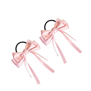 Set of two elegant light pink satin bow hair ties with long streamers and elastic bands