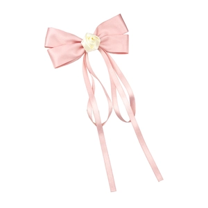 Pink satin bow hair clip featuring a cream rose and long elegant silk streamers