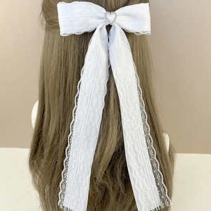 Elegant white lace bow hair clip with heart rhinestone and long streamers for women