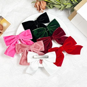 Velvet bow hair clips in seven elegant colors for women and girls' hair styling