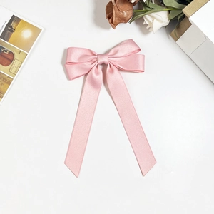 Elegant pink satin bow hair clip with long ribbons for women minimalist hair accessory