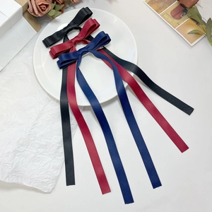 Three-piece ribbon bow hair clips set in black, wine red, and navy blue satin fabric
