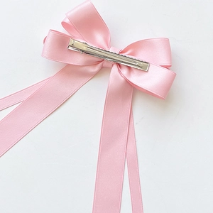 Pink satin ballet bow hair clip with long ribbons and silver metal duckbill clip