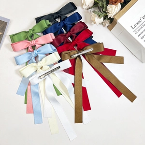 Elegante bunte Satin-Doppelschleifen-Haarspangen mit langen Bändern für Damen
