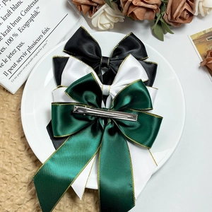 Elegante Haarklammern aus Satin mit Goldrand in Schwarz, Weiß und Dunkelgrün im Set