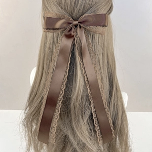 Elegant dark brown lace bow hair clip with long ribbons in satin finish for women