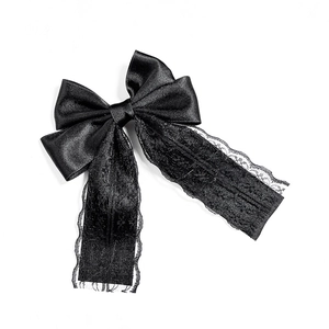 Elegant black double-layered lace bow hair clip with long satin ribbons on white background