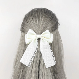 Elegant cream lace bow hair clip with long ribbons for women vintage style accessory