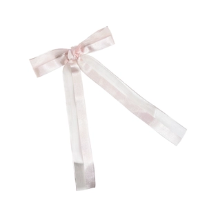 Pink and white silk mesh bow hair clip with long ribbons for women on white background
