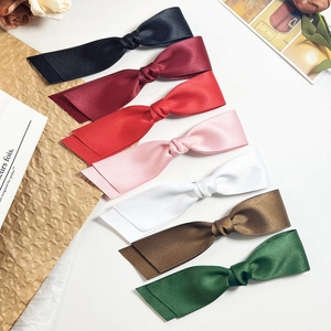 Elegante Satin-Schleifen-Haarspangen in mehreren Farben wie Schwarz und Weinrot