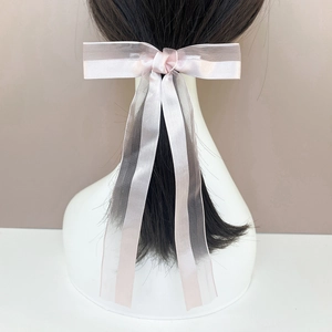 Elegant long tassel bow hair clip in pink satin and organza for women's hairstyle