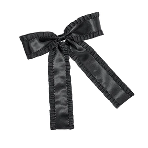 Elegant black satin hair clip with ruffled edges and bow design for sweet style