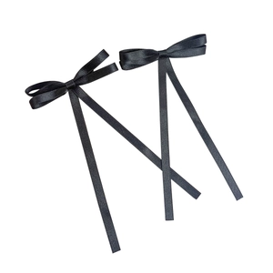Minimalist ballet style black satin ribbon bow hair clips in a smooth silk finish set