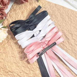Elegant ballet style satin bow hair clips in black, white and pink colors