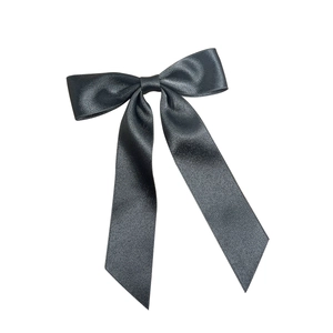 Elegant black satin bow hair clip with long ribbons for a minimalist korean style