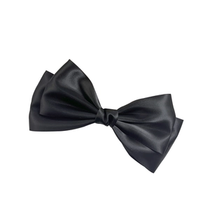 Elegant large black satin bow hair clip with a smooth glossy finish for women