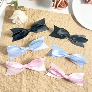Eleganti fermagli per capelli con fiocchi di raso in nero, blu e rosa con design doppio