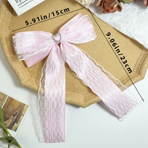Pink lace bow hair clip with heart rhinestone pendant and long ribbons for sweet styling