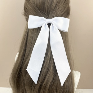 Elegant large white satin ribbon bow hair clip for women with long silk streamers