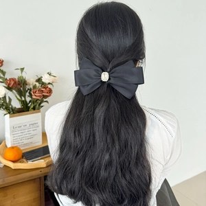 Elegante grote zwarte satijnen haarklem met strik en vintage strass versiering