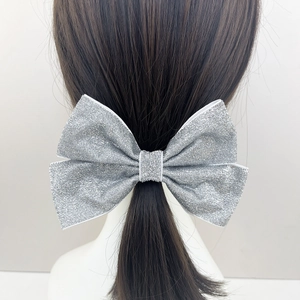 Barrette à cheveux élégante avec grand nœud argenté scintillant pour queue de cheval