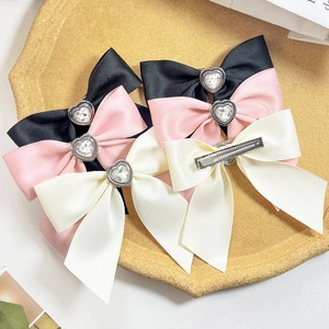 Three-piece set of sweet bow hair clips with heart rhinestones and duckbill clips
