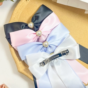 Lot de barrettes nœuds en satin avec pendentif cœur perlé en quatre couleurs