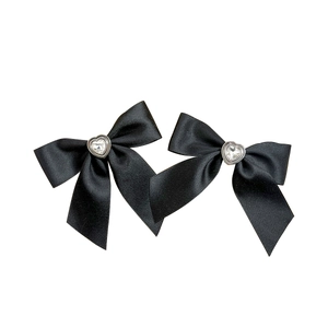 Pair of black satin bow hair clips with silver heart-shaped crystal center embellishments