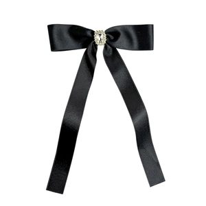 Elegant black satin bow hair clip with a rectangular faux gemstone and sparkling crystals