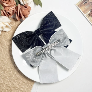 Sparkly sequins bow hair clips in black and silver with metal alligator duckbill clip