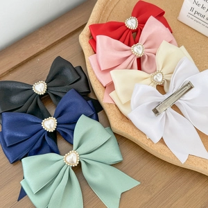 Silk satin bow hair clips set with heart pearl charms in seven elegant colors